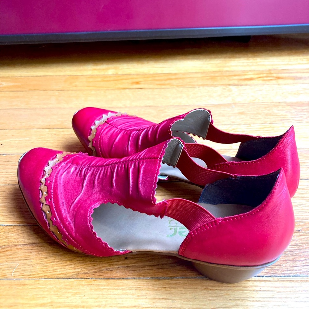 Rieker red leather heels with leather trim and soft heel.